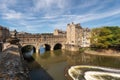 Pulteney Bridge and Weir on the River Avon in the historic city of Bath in Somerset, England.