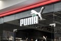 puma brand logo, a sign above the entrance to the company's brand store for the production of sportswear and accessories