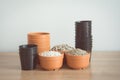 Pumice pebbles in cray pot and gardening tool