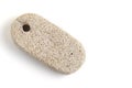 Pumice stone for cleaning feet and heels, on white background.