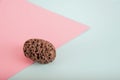 Pumice stone close up and copy space. Pumice stone 3d on a pink background. Beauty concept. Background for cosmetic product brandi