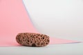 Pumice stone close up and copy space. Pumice stone 3d on a pink background. Beauty concept. Background for cosmetic product brandi