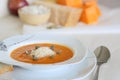 Pumkin cream soup with its ingridients in the background