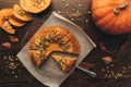 Pumkin pie on wooden table Royalty Free Stock Photo