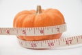 Pumkin and tape meter Royalty Free Stock Photo