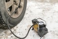 Pump, automobile compressor for inflating tires with air Royalty Free Stock Photo