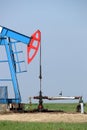 Pump jack and oil pipeline Royalty Free Stock Photo