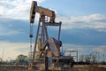 Pump jack pumping oil from the earth