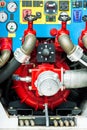 Pump panel on fire engine with valves and pressure gauges Royalty Free Stock Photo