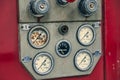 Fire Engine Side - gauges, controls and hose connections Royalty Free Stock Photo