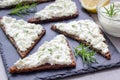 Pumpernickel bread with feta, cream cheese, rosemary, lemon, garlic dip Royalty Free Stock Photo