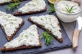 Pumpernickel bread with feta, cream cheese, rosemary, lemon, garlic dip Royalty Free Stock Photo