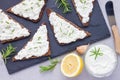 Pumpernickel bread with feta, cream cheese, rosemary, lemon, garlic dip Royalty Free Stock Photo