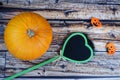 Pumpikin and heart of blackboard. Royalty Free Stock Photo