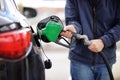 Pumping gas at gas pump Royalty Free Stock Photo