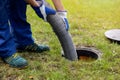 Pumping out household septic tank. drain and sewage cleaning service Royalty Free Stock Photo