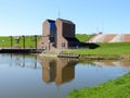 Pumping station Nordpolderzijl Noordpolderzijl in the province of Groningen, the Netherlands. Dam on the North Sea Royalty Free Stock Photo