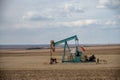Pumpjacks working in the oil fields of Alberta Royalty Free Stock Photo