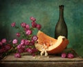 Pumpkin with autumn flowers