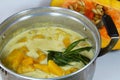 Pumpkin boiled in coconut milk on pot Royalty Free Stock Photo