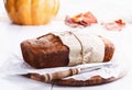 Pumpkin bread loaf over white wooden background Royalty Free Stock Photo