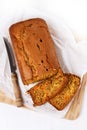 Pumpkin bread loaf over white wooden background Royalty Free Stock Photo