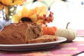 Pumpkin bread loaf on a white plate