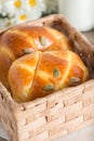 Pumpkin buns topping with pumpkin seeds in the basket. Royalty Free Stock Photo