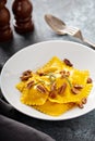 Butternut squash tortellini with brown butter and pecans Royalty Free Stock Photo