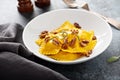 Butternut squash tortellini with brown butter and pecans Royalty Free Stock Photo