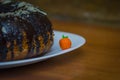 Pumpkin cake kuglof with brown chocolate dressing