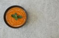 Pumpkin or carrot or sweet potato soup puree in a bowl on a grey background. Copy space. Isolated. Diet. Food background Royalty Free Stock Photo
