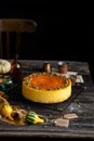 Pumpkin cheesecake with caramel sauce and seeds on top Royalty Free Stock Photo