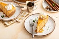 Pumpkin cheesecake with fall spices topped with whipped cream