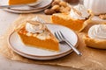 Pumpkin cheesecake swirl pie topped with whipped cream Royalty Free Stock Photo