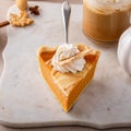 Pumpkin cheesecake swirl pie topped with whipped cream Royalty Free Stock Photo