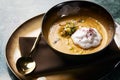 Pumpkin cream soup with cream and pumpkin seeds Royalty Free Stock Photo