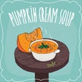 Pumpkin cream soup with fresh cut pumpkin