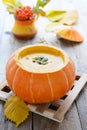 Pumpkin cream soup in pumkin Royalty Free Stock Photo