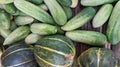 Pumpkin, cucumber top view, greenhouse cucumbers, long cucumbers, vegetables harvest, pumpkin food background. Place for text.