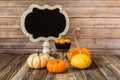 Pumpkin cupcake with gourds and chalkboard sign