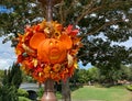 A pumpkin decor with fall leaves of Mickey Mouse at Magic Kingdom in Walt Disney World in Orlando, FL