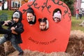 Three kids posing in a pumpkin Royalty Free Stock Photo