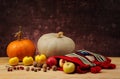 Pumpkin and ethnic bag of wool with fruits