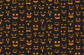 Pumpkin faces seamless pattern. Halloween jack o lantern face silhouettes texture. Monster ghost carving scary eyes and Royalty Free Stock Photo