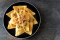 Pumpkin ravioli pasta, overhead on slate Royalty Free Stock Photo