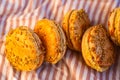 Pumpkin flavor orange color macarons Royalty Free Stock Photo