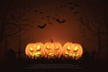 Pumpkin ghosts and tombstones appear in the grim forest. and a flock of flying bats background for halloween. Royalty Free Stock Photo