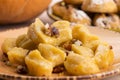 Pumpkin gnocchi with pecan nuts