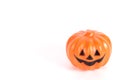 Pumpkin with halloween phrases on white background